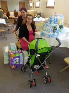 Mother and daughter with the gifts for baby