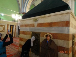 Me covered up and with an odd look at Rebecca's tomb in the Mosque at Hebron.