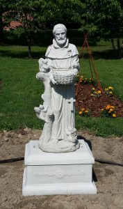 The new St. Francis statue in Grow Appalachia garden.